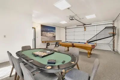 a room with a ping pong table and a pool table at Castlewood Retreat #2524 in Big Bear Lake