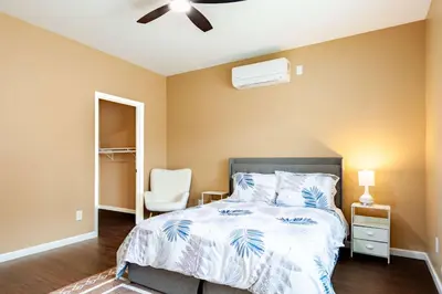 a bedroom with a bed and a ceiling fan at Cozy 2BR Home Mountain Views Pet Friendly in Thousand Oaks