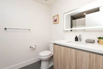 a bathroom with a toilet and a sink at Walk to Santa Monica Beach, Pier, Boardwalk and Venice in Los Angeles