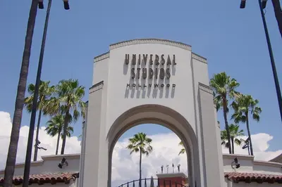 a building with a sign that reads universal strategies worldwide at Claudia's Guest House in Los Angeles