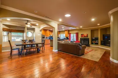 a living room with a couch and a table at F-25 Belles Castle in Anaheim