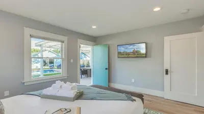 a bedroom with a bed and a window at F-39 Helena in Anaheim