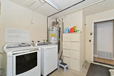 a laundry room with a washer and a dryer at F-57 Pride Rock in Anaheim