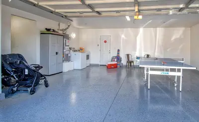 a room with a ping pong table and a kitchen at F-58 Mandos Hideaway in Anaheim