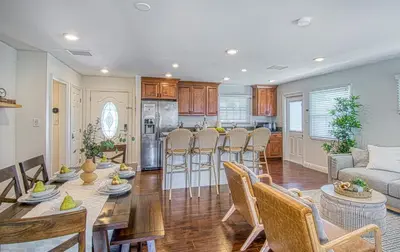 a kitchen and living room with a table and chairs at F-59 Goodhue in Anaheim