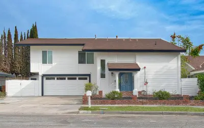 a white house with a brown roof at F-64 California Vibes in Anaheim
