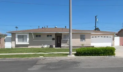 a house on the side of a street at F-18 Babes in Toyland in Anaheim