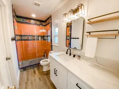 a bathroom with a sink and a toilet and a shower at F-23 Rapunzels Tower in Anaheim