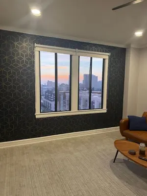 a living room with a window and a couch at Long Beach Panorama in Long Beach