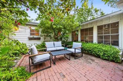 a patio with two chairs and a table at Pool & Spa Ping-Pong Mini-Golf & 5BR in Sherman Oaks