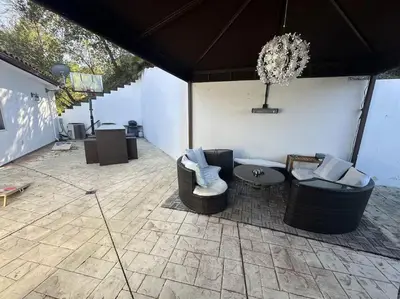 a patio with two chairs and a table in a tent at Room with a view in the Hills of Studio City -B in Studio City
