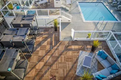 an overhead view of a living room with a pool at Modern Loft 1BR in Downtown LA! in Los Angeles