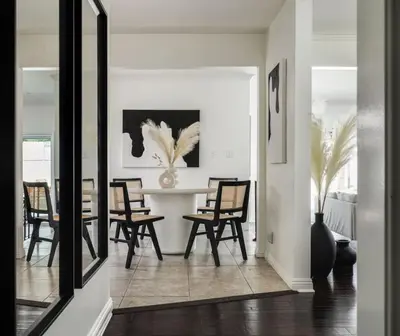 a dining room with a table and chairs at Blue Haven Solar Pool Heat Parking Billiards in Long Beach