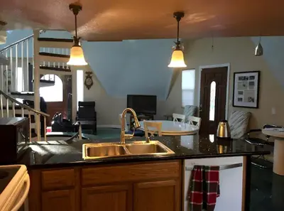 a kitchen with a sink and a counter top at Unique Three-Level Dome near Lake Gregory in Crestline, California in Crestline