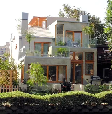 a large white house with a lot of windows at Venice Canals Contemporary, unique wildlife, amazing reviews in Los Angeles