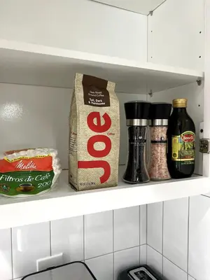 a shelf in a kitchen with some food items at Gated & Morden 1bed1bath house3367 in Baldwin Park