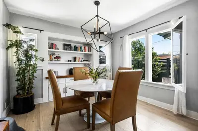a dining room with a table and chairs at Venice Gem Private Beach Bungalow in Los Angeles