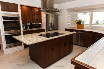 a large kitchen with a sink and a stove at Bella Villa near Beverly Hills Amazing City view and hot tub in Los Angeles