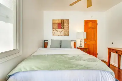 a white bedroom with a large bed in it at Steps to Ocean Manhattan Beach Gem with Deck! in Manhattan Beach