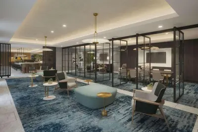 a rendering of a lobby with chairs and tables at Hilton Arcadia Los Angeles in Arcadia