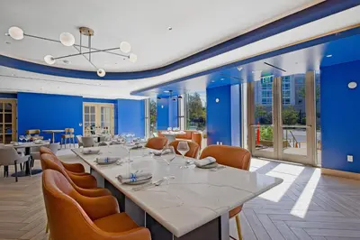 a large dining room with a long table and chairs at Hilton Arcadia Los Angeles in Arcadia