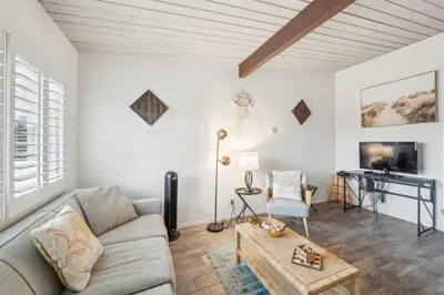 a living room with a couch and a table at Beautiful 1 Bed Beach Condo #224 in Carpinteria