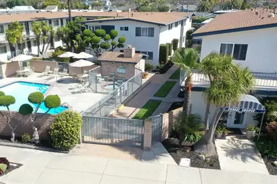 an aerial view of a house with a swimming pool at Beautiful 2 Bed Beach Condo #201 in Carpinteria