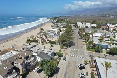 an aerial view of a beach with houses and cars at 4980 Sandyland Road #215 in Carpinteria