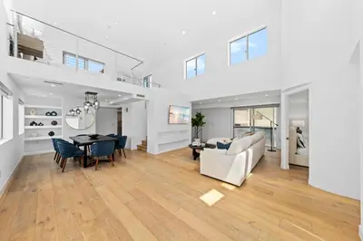 a living room with a table and a dining room at The Diamond Dune Three floors Two Balconies BBQ in Los Angeles