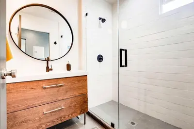 a bathroom with a sink and a mirror at NEW and Modern Cozy Flat in Southern California in Covina