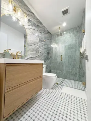 a bathroom with a sink and a toilet and a shower at Bright and Chic 3BR-3BA by Century City - FH-BV in Los Angeles