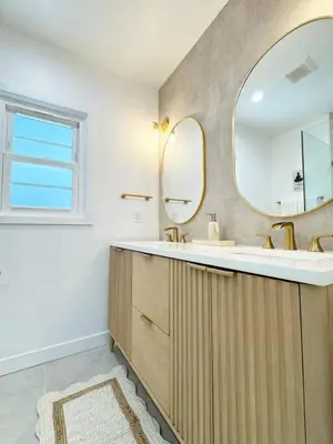 a bathroom with a sink and a mirror at Bright and Chic 3BR-3BA by Century City - FH-BV in Los Angeles