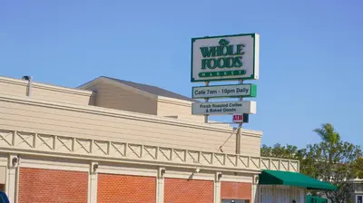 a building with a sign for a whole foods store at Cozy Private Guest House in Los Angeles