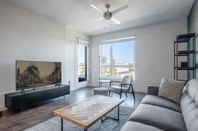 a living room with a couch and a table at Culver City 1BR w Pool Gym WD nr Downtown LAX-173 in Los Angeles