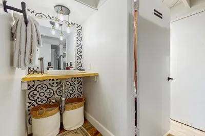 a bathroom with a sink and a mirror at Cielo Ridge in Twin Peaks