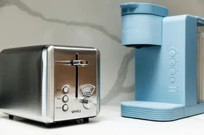 a toaster sitting next to a blue appliance at Stunning 2BR apartment steps from Santa Monica pier in Los Angeles