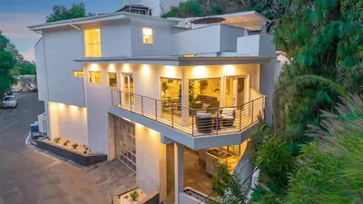 an aerial view of a white house with lights at Belden View in Los Angeles