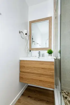 a bathroom with a sink and a mirror at NoHo Home Near Universal Studios in Burbank