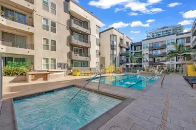 an image of a swimming pool in front of a building at Blueground Venice pool AC nr beach LAX-1330 in Los Angeles