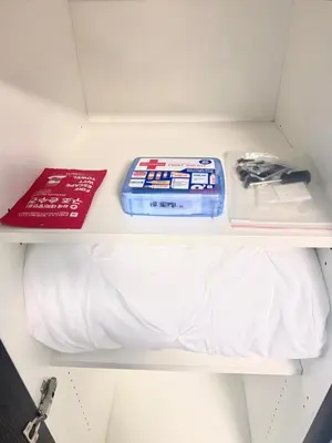 a shelf with a book and a box on it at Heart of Koreatwon, 1Bed Studio in Los Angeles