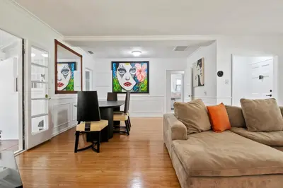 a living room with a couch and a table at 4bed 3bath spacious modern piano home near Universal Studio and Hollywood for 10 in Studio City
