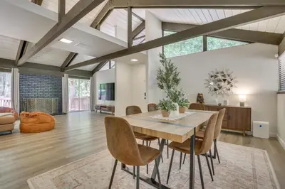 a dining room with a table and chairs at Ski, Hike and Explore! Twin Peaks Cabin with Deck in Twin Peaks