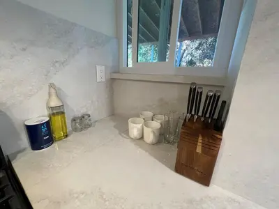 a kitchen counter with a knife block and cups at remodeled 2b 1b house Rosemead c in Rosemead