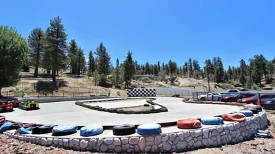 a large amphitheater with a fountain in a park at Walk to Village & Alpine Slide - Almost a View in Big Bear Lake