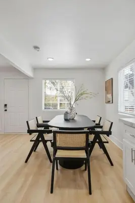 a dining room with a table and chairs at Modern Elegance- Big Group - Games - Sleeps 10 in Los Angeles
