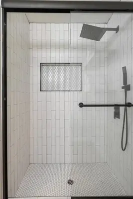 a shower in a bathroom with white tiles at 2-Story Sanctuary - Spacious Hot Tub - Billiards in Los Angeles