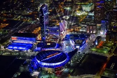 an aerial view of a stadium at night at ArtsDistrictDtLA-2022 BUILT WithVIEWS WD - GARAGE in Los Angeles