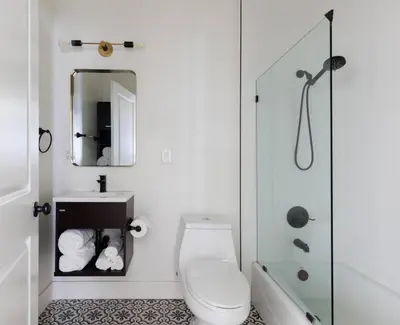 a bathroom with a toilet and a sink and a mirror at Iconic LACasita -FoodieBobaliciousCity- Mins2DTLA in Alhambra