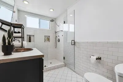 a white bathroom with a sink and a shower at HGTV Featured Modern Craftsman Mins2Beach GameRm in Long Beach