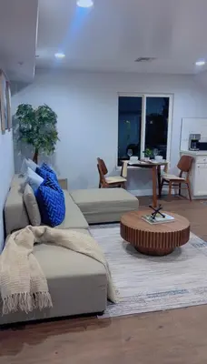 a living room with a couch and a table at Woodland Hills 1 Bedroom Getaway in Woodland Hills